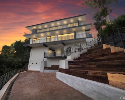 5710 Hill Oak. Property for Rent in Los Angeles, CA for $17,000 with 4 bedrooms and 3 full baths. This 3,372 square foot property was built in 1962 on a lot size of 0.183.. VIEWS, VIEWS, VIEWS! Presenting an exceptional contemporary smart home offering sweeping panoramic views of city lights, the Hollywood Sign, and the Griffith Observatory. Perched on a downslope with wrap-around terraces on e...