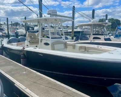 This 28 CC is fully equipped with everything you need for fishing or cruising. It boasts twin 300 HP Yamaha engines, a Garmin Radar/GPS/Sonar system with dual screens, two VHF radios, a windlass, a fresh water head, underwater lights, outriggers, and a bow filler cushion. This impressive 28 XS is ready for its next owner. For more information and to schedule a viewing, contact Steve at 401 265 ...