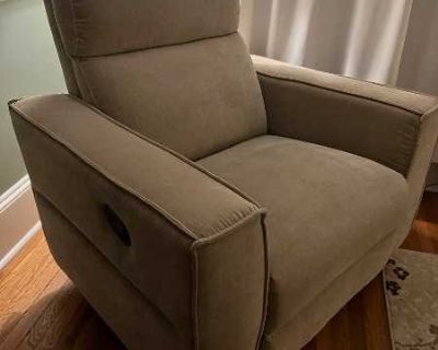 Manual recliner, light beige, rocks, swivels, reclines. In great condition, no stains or tears. From a non-smoking household with dogs. 42.5" wide, 34.5" deep. Must collect.