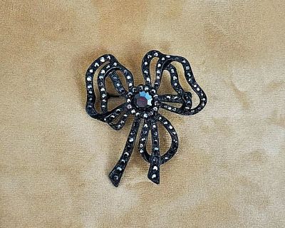 Vintage (c1995) black enamel, clear and black rhinestone floral pin brooch by St John
