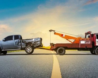 Roadside Assistance with a Flatbed Tow Truck Rental