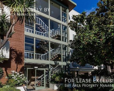 Bright, top floor unit with updated kitchen. One block from downtown San Carlos.