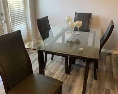 *Fast Sale* Glass Table & 4 solid leather chairs