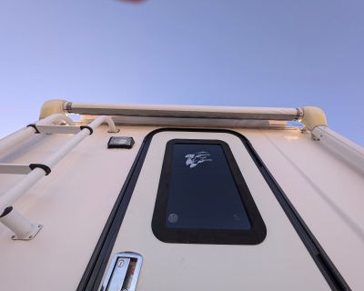 The 2019 NORTHERN LITE 9-6Q LE is a top-of-the-line Truck Camper that offers both luxury and functionality for your outdoor adventures. The "WETBATH" trim indicates that this model comes equipped with a wet bathroom, allowing you to shower and freshen up while on the road. The sleek design of the camper combined with its high-quality construction makes it a standout choice for those looking for...