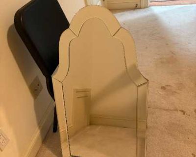 Mirror with hanging wire