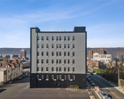 70A Ashburton Ave Unit 2E. No Amenity Fee Ever! No Hidden Fees Ever! Parking Included! Stunning Building in The Heart of Downtown Yonkers! Located Just 8 Non-Motorized Minutes from the Yonkers Train Station and a 29 Minute Ride to Grand Central. Building Features 4 Laundry Rooms w/ Wifi Machines, 3 Fitness Centers, Virtual Doorman, Lounge w/ Coffee Bar, Package Acceptance Room, Full Porter Staf...