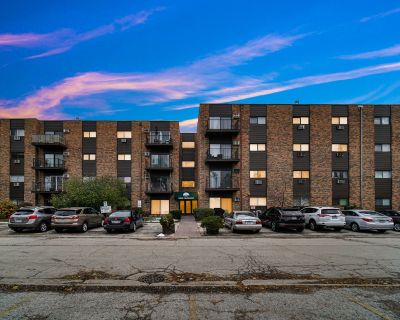 8936 N Parkside Avenue, 402. LARGE CORNER UNIT - COMPLETELY UPDATED! This spacious corner unit has been beautifully renovated from top to bottom. Enjoy brand-new bathrooms, all new flooring, and new appliances throughout. The unit features three wall A/C units to keep you comfortable year-round. Located in a well-maintained complex offering great amenities, including a large playground and tenn...