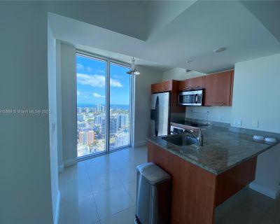 SW 7 ST. This spacious 2-bedroom, 2.5-bathroom corner unit is filled with natural light and offers fantastic views. It features elegant tile floors and convenient walk-in closets. Perfect for those who enjoy leisurely strolls, the unit is ideally located near exceptional dining and shopping, with easy access to the metro and highways. The unit includes valet parking for one car, with additional...