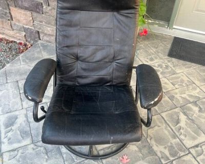 Black swivel/reclining chair
