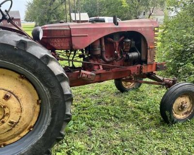 Massey Harris 44 diesel. Decent metal, motor loose. Tires good