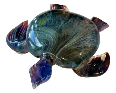 This beautiful giant turtle was handmade by Oscar Zanetti, one of the top glass masters in all of Murano. Made with Calcedonia glass and measures over 20 inches across. A truly stunning piece of Murano Glass!. Dimensions 20 W 19 D 6 H Styles Traditional Art Subjects Animals Period 2020s Country of Origin Italy Item Type Vintage, Antique or Pre-owned Shop Sustainably with Chairish Materials Mura...