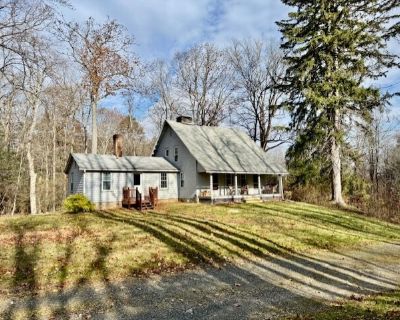 567 Firetown Road. Charming Historic Cottage in a private, woodland setting! Set in a serene oasis amid miles of McLean Game Refuge trails and protected land, this delightful two-bedroom Cape-style cottage blends history, charm, and nature. Features include original wide board wood floors throughout, updated kitchen and full bath, center chimney with wood-burning stove. A welcoming front porch ...