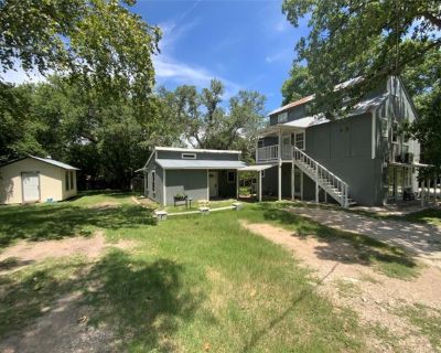 2704 Palomino Dr. EANES SCHOOLS. Walk to Lake Austin from this unique, two home property in Austin Lake Estates. Original home is a 3 story home with 2 bedrooms, 1 bath, 2 living, one office. Second home is one bedroom, one full bath both set on tree shaded, extra large double lot. Guest house features seperate water heater and sub-panel. Rare find at this price. Voluntary HOA with lake front p...