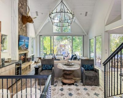 345 Park Ave. Beautiful contemporary mountain house with almost 4000 sq ft of indoor living space sitting sublimely on the Roaring Fork River and still easily walkable to downtown Aspen. Massive Ajax views and the tranquil river atmosphere can be enjoyed from all over the giant wrap-around main-floor deck and from the beautiful setting on the lower level which includes a manicured lawn, hot tub...