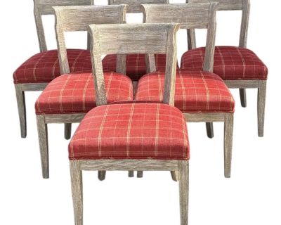 Set of 6 Regency style side chairs with cerused finish. The seats are upholstered in vermillion tan and beige window pane plaid. These chairs are a perfect marriage of formal and casual with their classic lines and rustic finish. The windswept, driftwood-like surface will make them great for a coastal or mountain or desert home. We have 14 of these chairs sold in sets of 6, 8, or 14. No marking...
