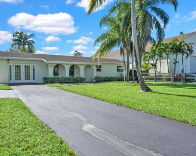 8392 Pinto Dr. Beautiful single-family home in the desirable Palm Beach Ranchettes neighborhood. This property is situated on a full acre of land, offering a completely fenced yard with plenty of space for parking equestrian trailers, a boat or RV. The interior has been newly updated with a brand new kitchen featuring new appliances, tile flooring in all bedrooms and newly remodeled bathrooms. ...