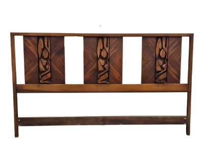 KING Size Mid Century Brutalist Headboard By United Furniture Now Available. Featuring Awesome Flamed Walnut Panels With A Kneeling Tiki Style Figure On Each. In Excellent Condition.. Dimensions 80 W 3 D 46 H Styles Brutalist Mid-Century Modern Bed Size King Brand United Furniture Corporation Period 1960s Country of Origin United States Item Type Vintage, Antique or Pre-owned Shop Sustainably w...