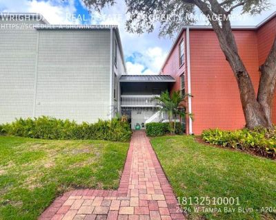 2424 W Tampa Bay Blvd. Elevate your lifestyle with this captivating two-bedroom, one-and-a-half-bathroom condo situated along the picturesque Hillsborough River in Tampa, FL. Boasting modern elegance and urban convenience, this residence offers an unparalleled living experience. The large open living and kitchen space creates an inviting atmosphere, perfect for both relaxation and entertainment...