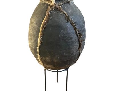 We purchased this piece from a colleague specializing in Amazonian art and antiquities. He stated that the pot was purchased in the 1970s by a friend traveling in the region of production. It is clearly of Tarahumara origins with typical ceramic composition, coil construction, and rawhide strapping. Note that there appears to be an ethnographic repair on the lip of the pot, suggesting it has se...