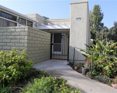 2375 Via Mariposa W Unit B. Single Story, End unit Condominium, Valencia Floorplan has 2 Bedrooms / 2 Bathrooms and Enclosed outdoor patio for added living space. Open Atrium for Air, Light and Bright. Great location, It's quiet and close to carport, Walking distance to Clubhouse 4. No steps inside or out from your front door to the carport. Double Front Doors, Newer Front Gate, Scraped Ceiling...