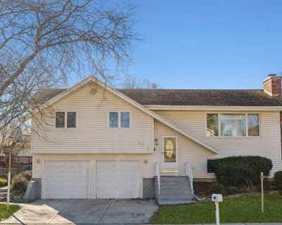 829 Pinehurst Lane. Fantastic Opportunity, Sun Filled 4 Beds, 2.5 Baths with Attached 2 Car Garage Near All Amenities. Open Floor Plan - Entertainer's Dream. Large Kitchen w/ Island, Granite C Tops and SS Appliances. Combo Living/ Dining Room Leads To Oversized Deck, Overlooking a Lush Fenced in Yard. Updated Baths. 3 Beds On Upper Level, 2 Full Baths. Lower Level Offers Family Room with Firepl...