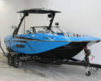 This is a Consignment Unit - Inspection Completed2021 Malibu Boats 21 MLXTHE ALL-DAY WAKESETTERReady to wakesurf or wakeboardThe 21 MLX is one of the most value-conscious, performance-minded wake boats in the Malibu line. The progressive wide-nose bow is the standout feature on the 21 MLX s clean interior that features all the modern amenities you are looking for. With this many available Malib...