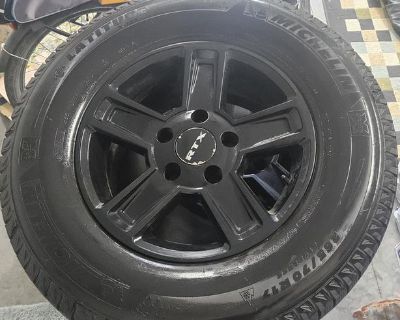 (4) Dodge Ram wheels with new snow tires OBO