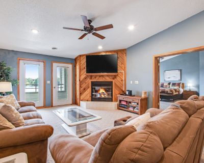 Avg / night: $264. Beautiful lakefront home w/free WiFi, full kitchen, shared pool & hot tub | Located in Wisconsin Dells, WI | 4.3 Stars | 2 Bed, 2 Bath | No Pets. No pets. Max 6 guests. Get ready to make beautiful new memories with your friends and family with this spectacular lakeside homed perfectly positioned no more than 10 feet from the cool blue waters of Lake Delton. Spread out in comf...