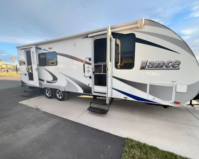2015 Lance Travel Trailer 2285, 2015 Lance 2285 27' Travel Trailer. 1 Slide Out, Awning, A/C Unit, Sleeps 6 4-Season, Stored Under Cover, Excellent Condition! This beautifully maintained 2015 Lance 2285 is a high-quality, lightweight 4-season travel trailer built with Lance s signature construction: aluminum-framed, Azdel composite walls, and exceptional insulation. Second owner, stored under c...