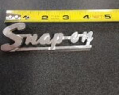 Snap-on 1950's-1960's chrome script toolbox badge. KN 100