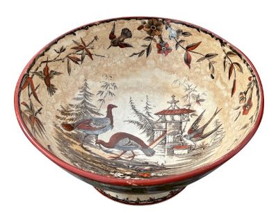 19th C. Chinese Export British Market Centerpiece Bowl Unusual burnt orange autumnal color way with turkey birds / fowl in front of a chapel - traditional harvest season themes. 11.25" across diameter on a 5.25" tall pedestal. Beautiful border with four unique images - hummingbird like sparrows or swallows and beautiful florals. Proper English market mark on the bottom - Ridgways Indus with sup...