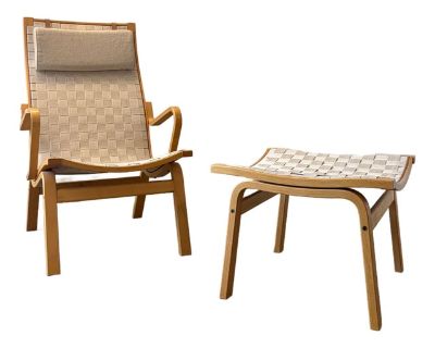 Dimensions: Chair: 24 7/16" W 27 9/16" D 38 3/8" H / Seat Height: 15 3/4" H Ottoman: 20 7/8" W 21 1/4" L 15 3/4" H Origin: Denmark Designer: Finn stergaard Manufacturer: Kvist M bler Year: ca 1960s Materials: Beech, Canvas Details: Versions of the Albert have been sold worldwide since its introduction; given how comfortable it is and the bentwood construction, it is no wonder it is popular! Fin...