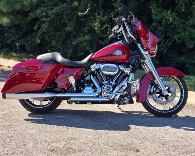A factory-custom bagger with highway-shredding power, in a blacked-out or chrome finish.