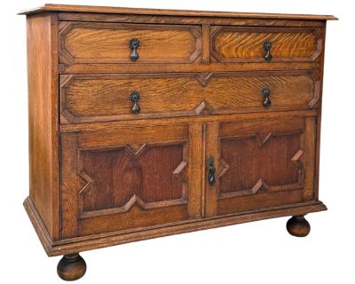 Early 20th Century Antique Jacobean Style English Cabinet With Oak Construction and Metal Drop Pulls