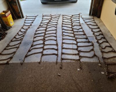 One pair of doubles for 11/24.5 tall with 6 point rubber chain tightners. $120.00Four pair of singles for 11/24.5 tall. $60.00 per pair. Interested call 785-443-4041 $60.00 for all!!!